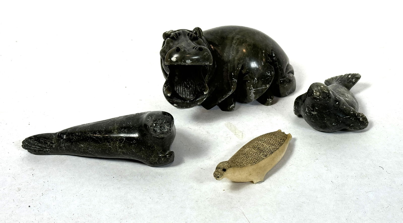 3 CARVED INUIT FIGURES, 6" AND SMALLER (1 of 6)