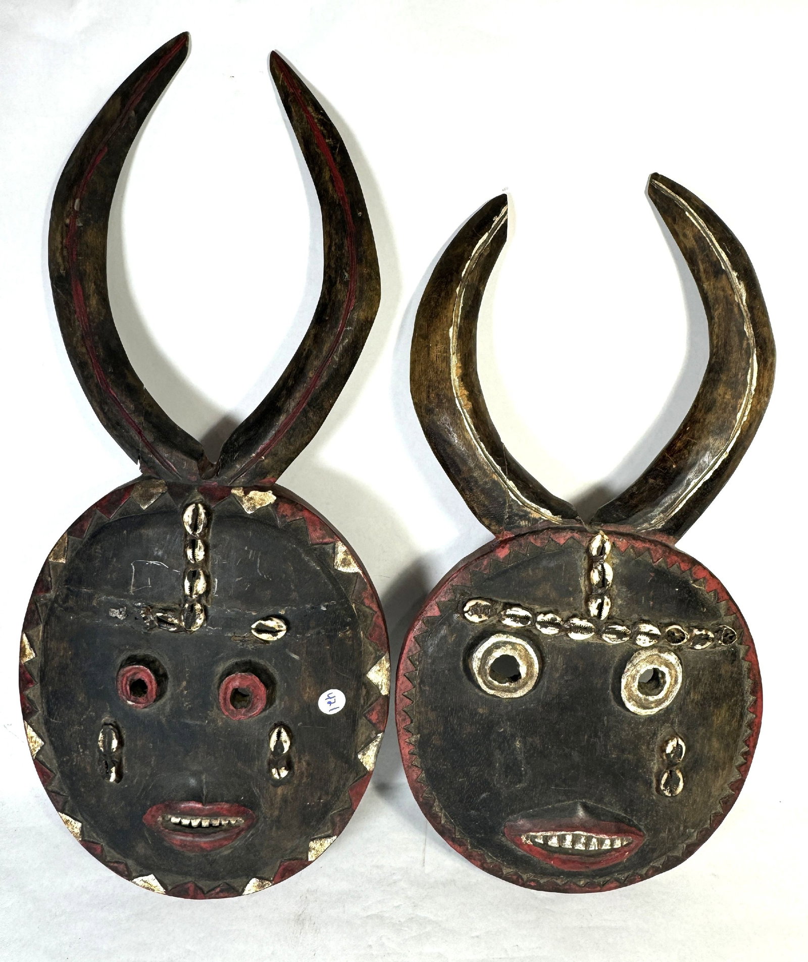 2 TRIBAL MASKS WITH SHELLS. 12" X 25": 2 TRIBAL MASKS WITH SHELLS. 12" X 25"