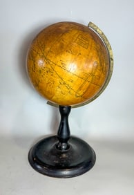 A LATE 19TH CENTURY TERRESTRIAL GLOBE ON STAND