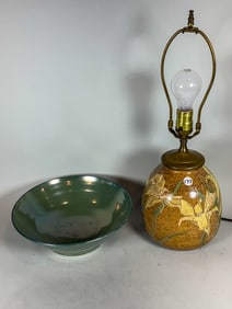 AN ARTISAN SIGNED ART POTTERY LAMP AND GREEN GLAZED BOWL, 20" LAMP AND 11" X 5" BOWL