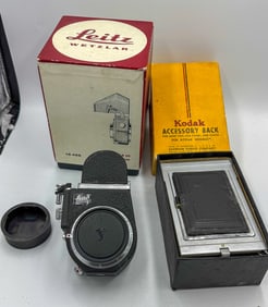 LEICA VISOFLEX  3 MIT LUPE  IN BOX AND A POLAROID BACK IN BOX