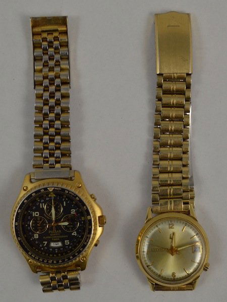 2 14K GOLD MEN'S WRISTWATCHES: 1 14 K GOLDFILL ACCUTRON MEN'S WRISTWATCH. MARKED "G798910." 76.12 GRAMS. 1 PULSAR MEN'S WRISTWATCH. MARKED "90834." 93.55 GRAMS. BOTH IN GREAT CONIDTION.