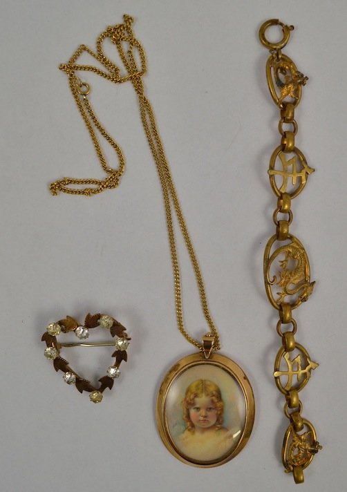 LOT OF 10K GOLD JEWELRY: LOT OF 10K GOLD JEWELRY INCLUDING: LOCKET WITH MINIATURE PORTRAIT OF GIRL (2.55 GRAMS, 2.375" X 1.5", CHAIN: 21" LONG), GOLD & DIAMOND PIN WITH LEAF & HEART DESIGN (0.25 OZ, 1.5" X 1.5") AND A BRACELE
