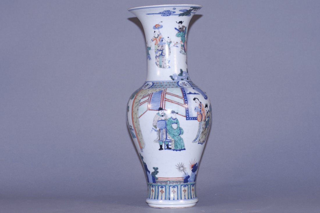 famille vert vase: vase, china, decorated with war story. Double ring mark on base. 17.5" x 6.5" x 6.5"