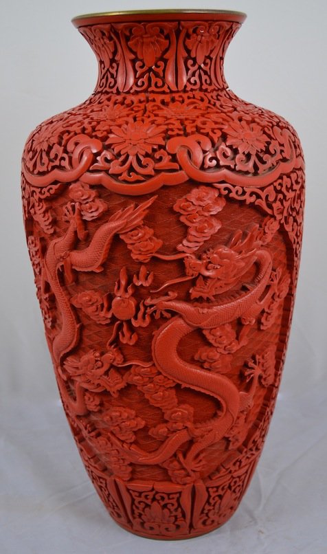 INTRICATELY CARVED CINNABAR VASE: INTRICATELY CARVED CINNABAR VASE. 15" HEIGHT