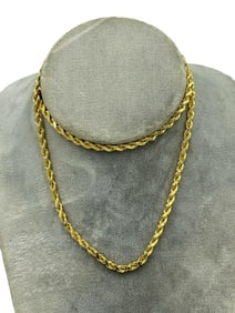 14K GOLD MACHINE MADE SOLID ROPE LINK NECKLACE W/ LOBSTER CLAW CLASP. 24" LONG AND 32.6 GRAMS