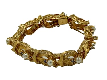 14K GOLD HAND ASSEMBLED FASHION BRACELET W/ BOX CLASP AND PEARLS/TANZANITE. 35.6 GRAMS TOTAL AND