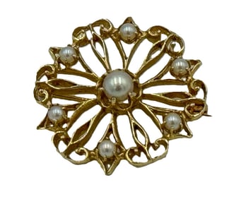 A 14K GOLD AND PEARL PIN, 9.95 GRAMS
