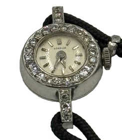 AN 18K GOLD AND DIAMOND SWISS LADIES WATCH
