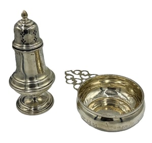 A STERLING SILVER CASTER AND PORRINGER 8.5 TROY OUNCES