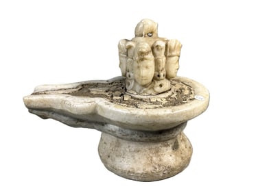 A CARVED STONE SOUTHEAST ASIAN FOUNTAIN, 11" X 10" X 14"