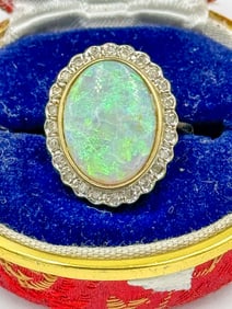 A 14K GOLD OPAL RING W/ DIAMONDS, 6.6 GRAMS