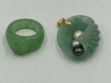 A JADE RING AND A JADE PENDANT