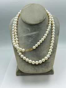 STRAND OF CULTURED PEARLS W/ 18K CLASP