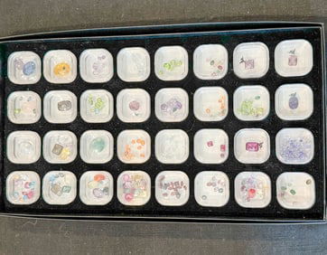 32 CONTAINERS OF VARIOUS GEMSTONES