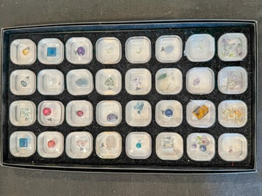 32 CONTAINERS OF VARIOUS GEMSTONES