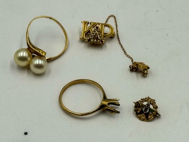 A 14K PIN, 10K PIN, AND 2 10K RINGS, 8.3 GRAMS