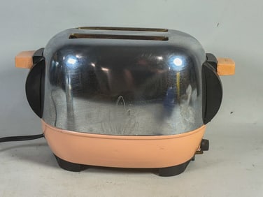 VINTAGE MAGIC MADE PINK AND CHROME TOASTER, 13" X 6" X 7"