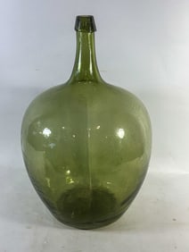 19TH CENTURY GREEN HANDBLOWN DEMIJOHN, 11" DIAMETER X 20" TALL
