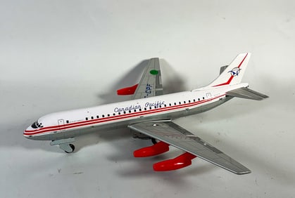 CANADIAN PACIFIC SUPER DC 8 TIN LITHOGRAPH AIRPLANE, 17" X 17"
