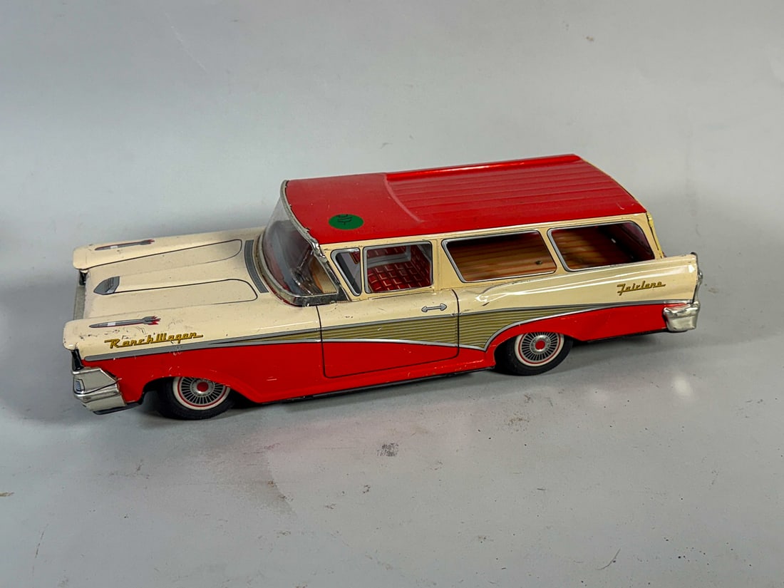 A TIN LITHOGRAPH FOR FAIRLANE RANCH WAGON, 14" X 5.5" X 4" (1 of 5)