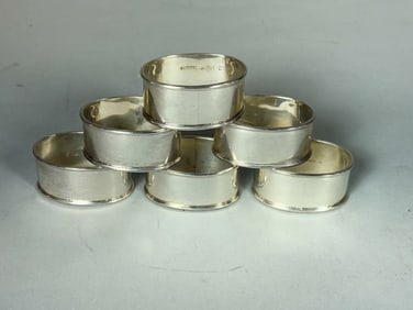 6 STERLING SILVER NAPKIN RINGS, 4.34 OZT