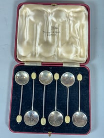 A CASED SET OF ENAMELED SILVER BARRY SPOONS BY WALKER HALL AND SHEFFIELD