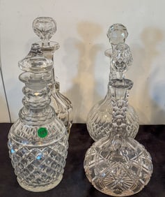 FOUR ANTIQUE CRYSTAL DECANTERS 13" AND SMALLER