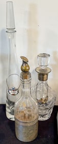 THREE ANTIQUE DECANTERS, TWO WITH LABELS, 20", 12.5", 12"