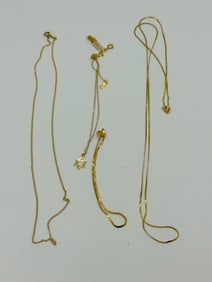 2 14K GOLD NECKLACES AND A 14K GOLD BRACELET, 4.4 GRAMS