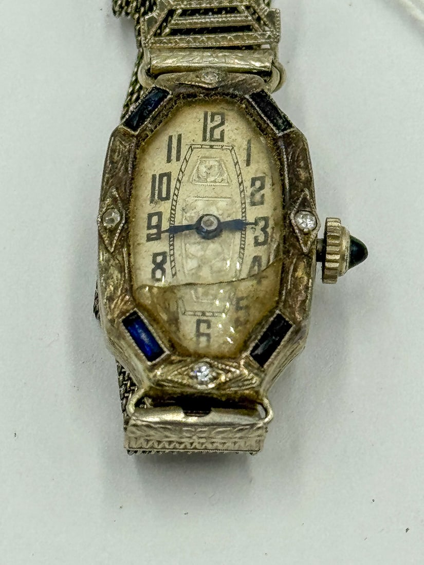 18K GOLD DIAMOND AND SAPPHIRE LADIES WRISTWATCH W/ 14K GOLD FILLED BAND. CRYSTAL AS IS: 18K GOLD DIAMOND AND SAPPHIRE LADIES WRISTWATCH W/ 14K GOLD FILLED BAND. CRYSTAL AS IS