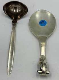 A GEORG JENSEN LADLE, AND A GEORGE PEPIN SPOON
