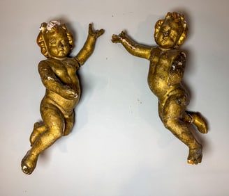 A PAIR OF 17TH CENTURY HAND CARVED ITALIAN PUTTOS 16"X 9" X 6"