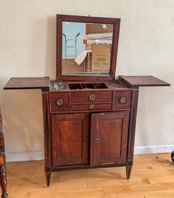 ANTIQUE LIQOUR CABINET, 27.5" X 14" X 31". BACK LEG NEEDS TO BE REPAIRED.