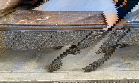 A HEAVY CARVED CHINESE LIBRARY TABLE W/ POLISHED MARBLE TOP, 62" X 28" X 29.5". MARBLE TOP HAS