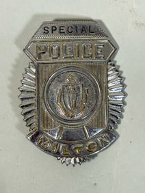 A MILTON POLICE BADGE