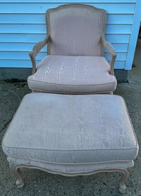 A FRENCH PROVINCIAL STYLE CHAIR AND OTTOMAN, 30" X 28" X 36"