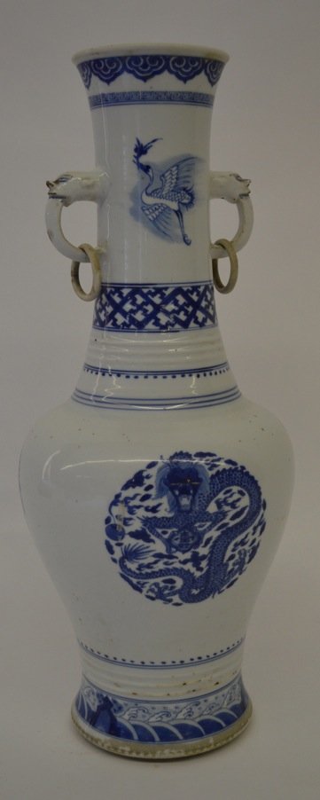 ANTIQUE CHINESE BLUE AND WHITE URN VASE: ANTIQUE CHINESE BLUE AND WHITE URN VASE. 18" HEIGHT. A HOLE HAS BEEN DRILLED IN THE BOTTOM FOR CONVERSION TO A LAMP, MINOR CRACK & CHIP ALONG TOP EDGE OF VASE (PICTURED).