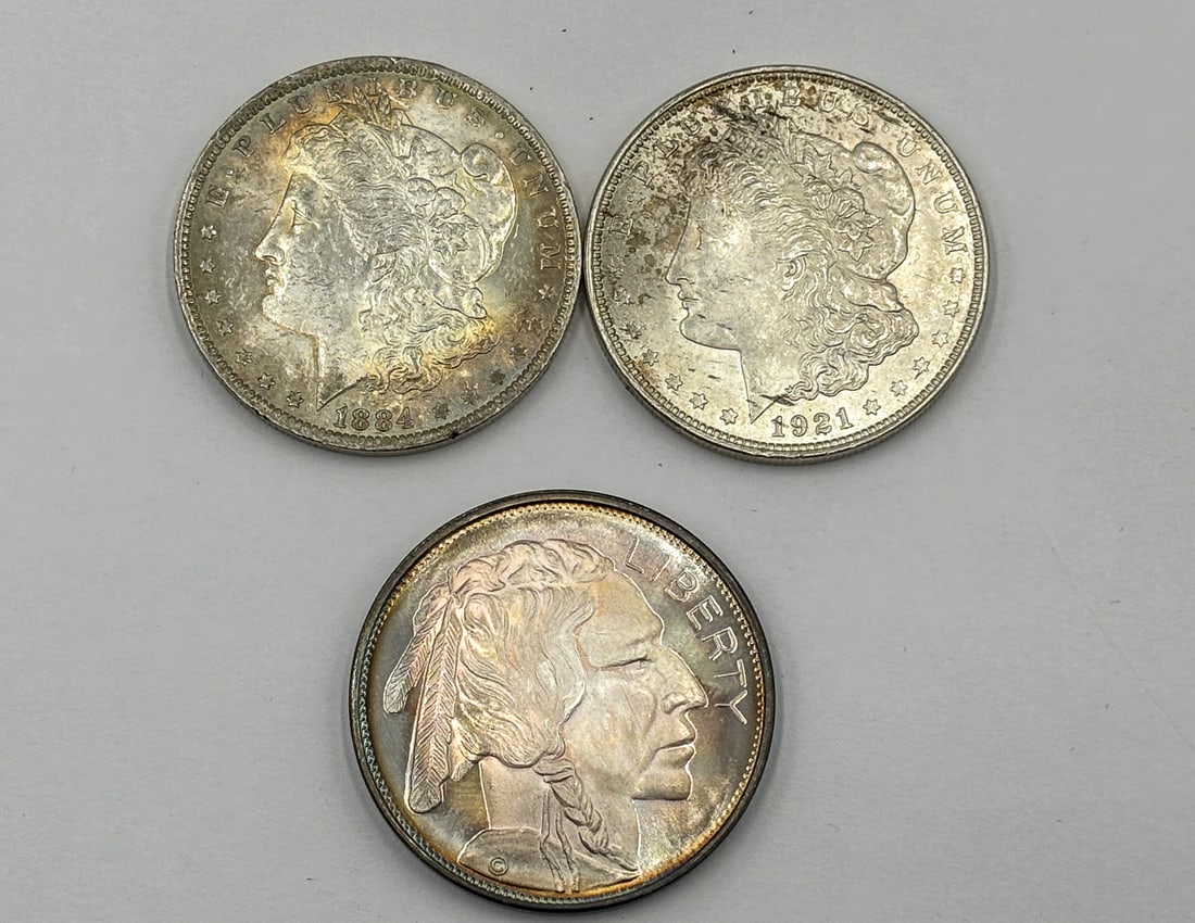 2 MORGAN DOLLARS AND A 1 OUNCE LIBERTY COIN, 84.5 GRAMS (1 of 7)