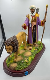 THOMAS BLACKSHEAR FIGURAL GROUP MAN W/ LION, 15" X 7" X 13"