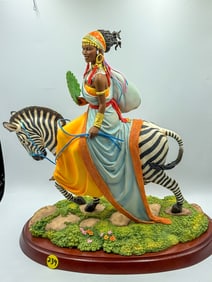 THOMAS BLACKSHEAR FIGURAL GROUPING OF A WOMAN ON A ZEBRA, 12" X 7" 14"