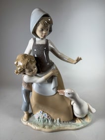 LARGE LLADRO GIRL AND BOY W/ SWAN, 10"