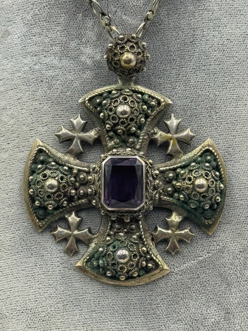 STERLING SILVER HAND CHASED CROSS W/ AMETHYST, 51.28 GRAMS: STERLING SILVER HAND CHASED CROSS W/ AMETHYST, 51.28 GRAMS