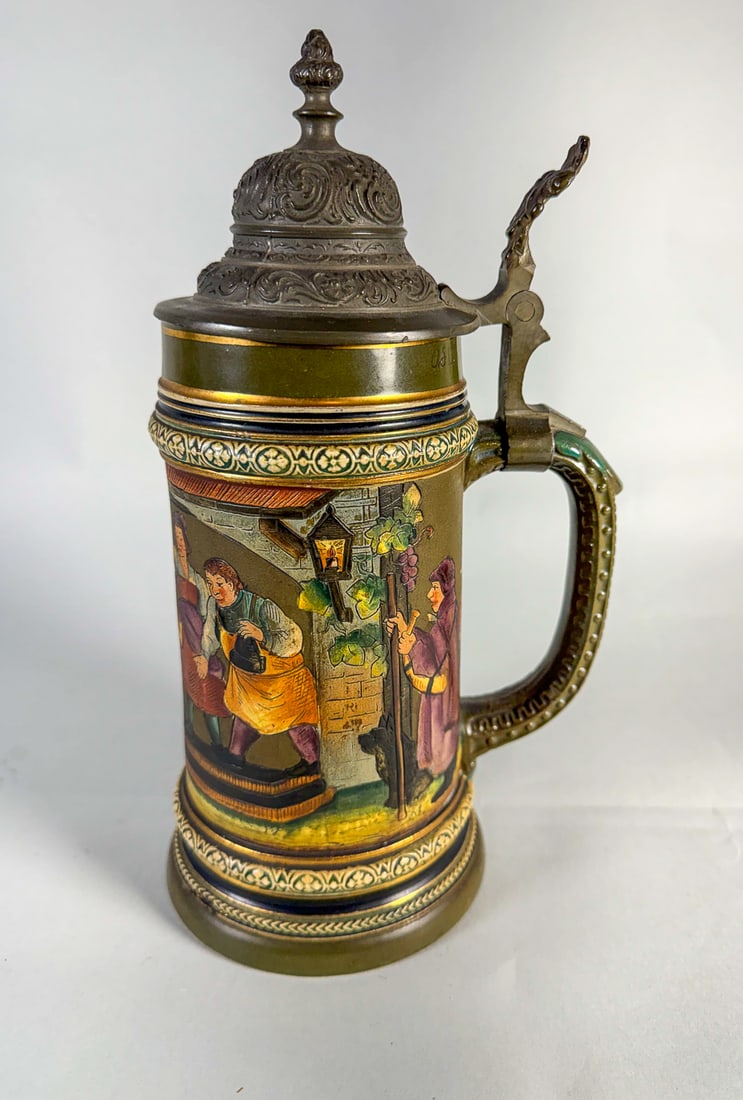 A METTLACH GERMAN STEIN AND A GOUDA VASE (1 of 5)
