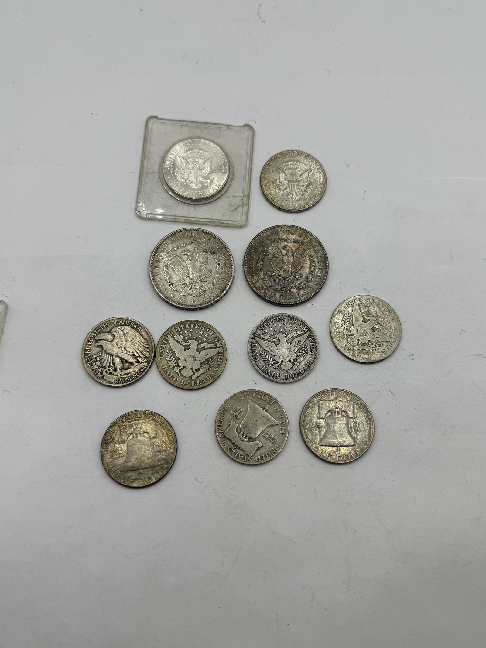 2 MORGAN DOLLARS AND 9 SILVER HALF DOLLARS 5.25 TROY OUNCES - 7