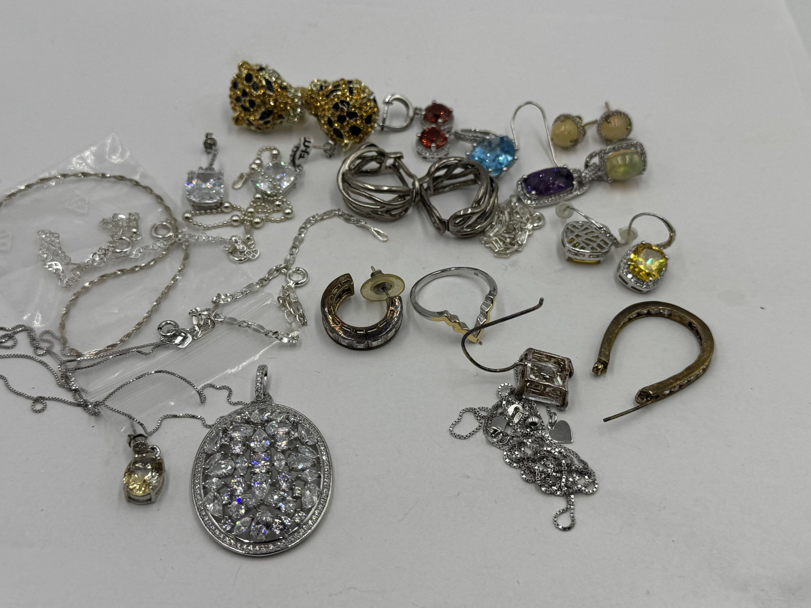 MOSTLY STERLING SILVER EARRINGS AND NECKLACES (1 of 3)
