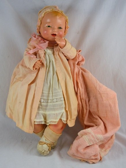 Antique 1924 Effanbee Porcelain Doll: Antique 1924 Effanbee Porcelain Doll, Made in the USA. Blanket Included. Doll in good condition- minimal wear or surface damage- no loss. Clothing shows wear and discoloration. 21" long.