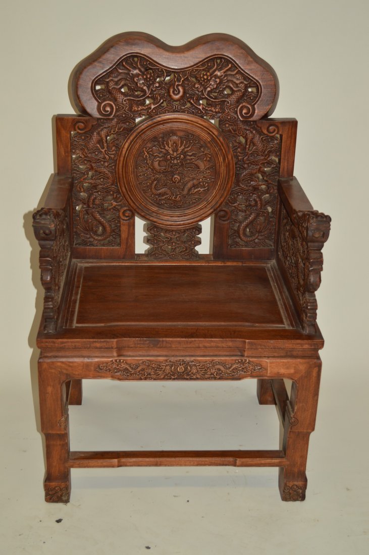 Carved Huanghuali Wood Chair: huanghuali wood chair. Carved dragon pattern. 47" X 27 1/2" X 21".