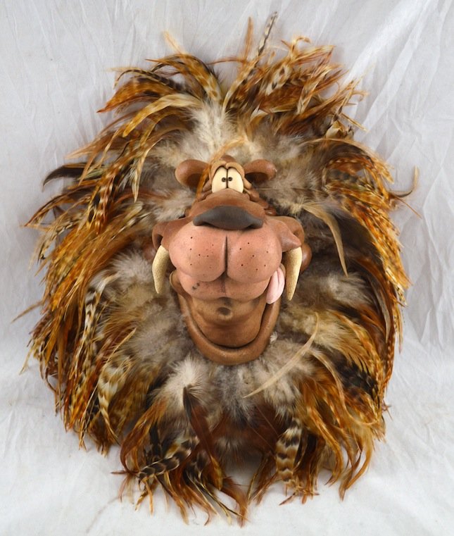 Lion Feather Mask, by Todd Warner: Lion Feather Mask. 16'' x 14'' Artist: Todd Warner