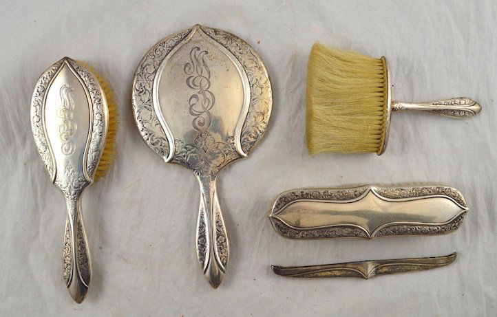 5 Pcs. Sterling Silver Dresser Set: 5 Pcs. Sterling Silver Dresser Set. Mirror: 10 1/2'' x 5 1/2''